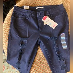 Brand new LEVIS with tags       Levi’s 711 skinny size 33 Distressed Black Jeans